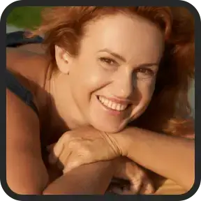 Smiling woman, a satisfied Mitolyn user Sarah T., who experienced increased energy and weight loss