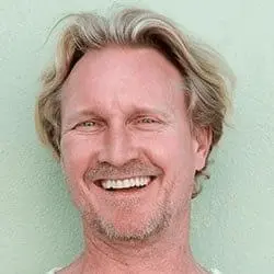 Smiling man, a satisfied Mitolyn user James P., who achieved weight loss and improved energy